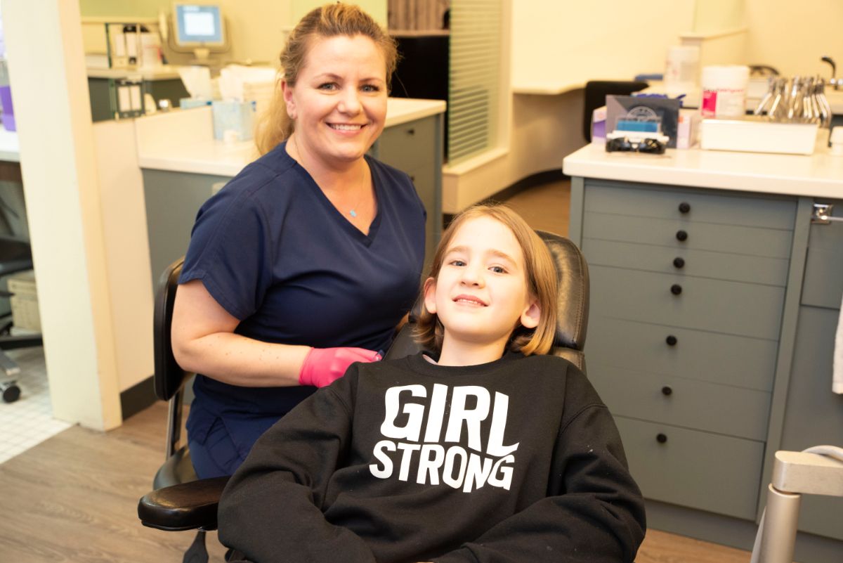Brady and Ford orthodontic assistant with a patient